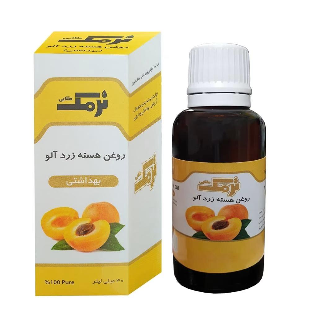 روغن بدن نرمک طلایی مدل هسته زرد آلو کد N.T حجم 30 میلی لیتر